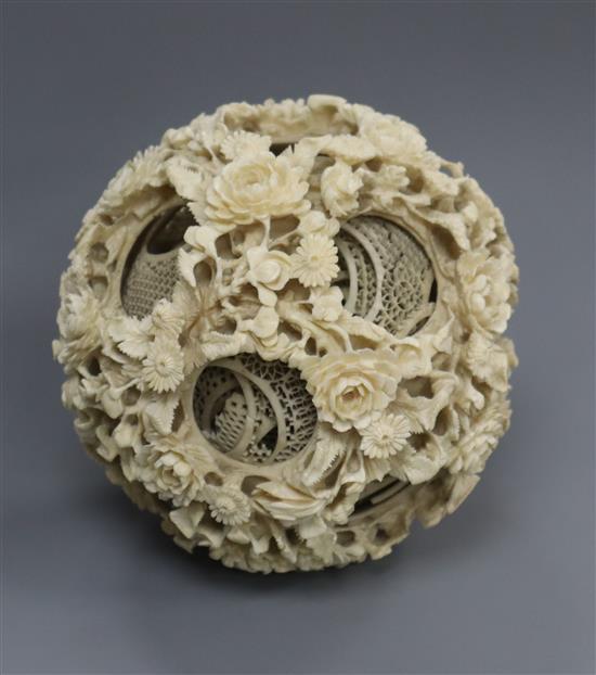 A large Chinese ivory concentric ball H.12cm